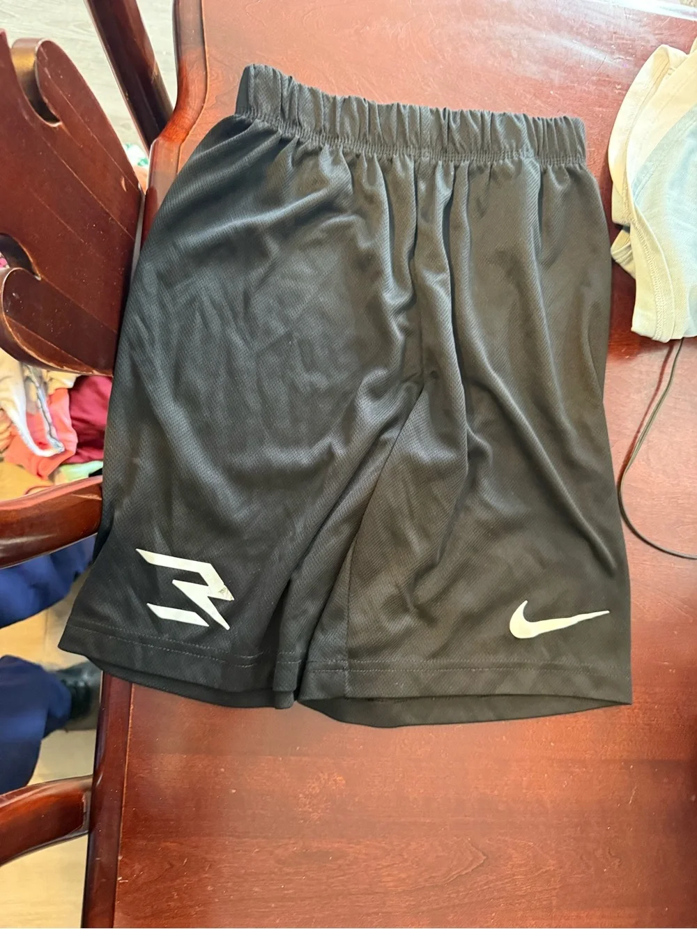 Nike Black Kids Athletic Shorts with White Swoosh